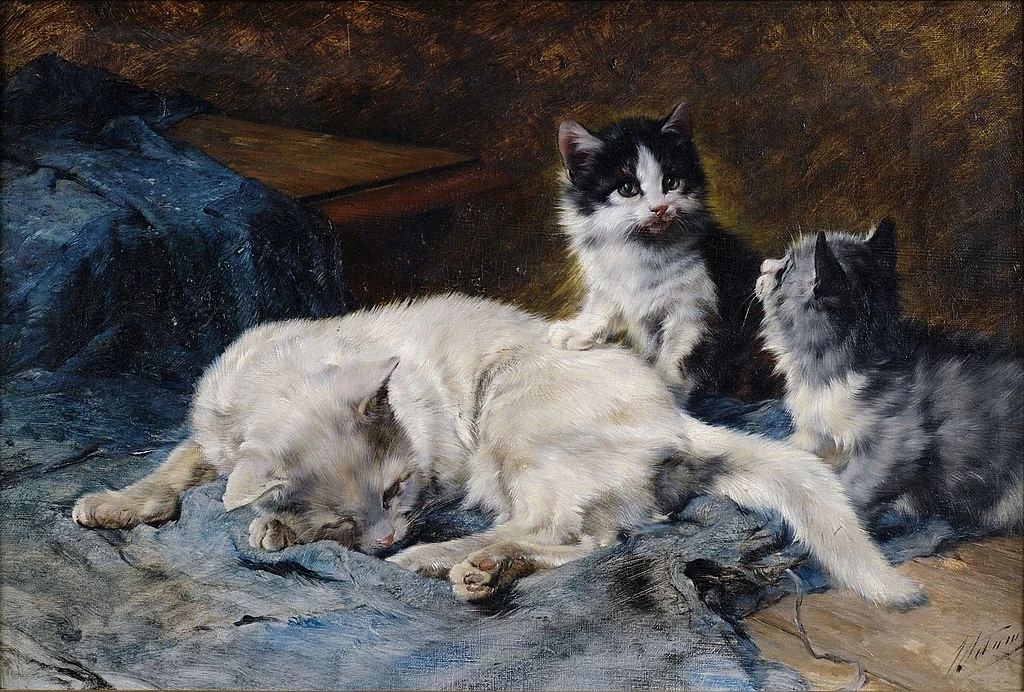 Mamma gatta con due gattini
